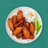 Wing Dings · Fresh chicken wings breaded and fried until golden brown with your choice of flavor. Served ...