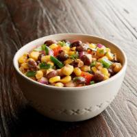 Roasted Corn & Black Bean Salad · Roasted corn, black beans, & other fresh veggies blended together. Try as a side or a dip!