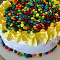 M&M Flood Cake · Serves 10-12. Chocolate and Vanilla froyo layers, with a filler of delicious brownie bites, ...