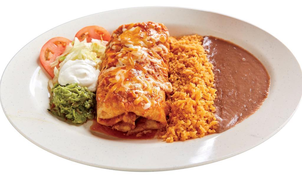 Chicken Chimichanga · Mexican-American fusion of a large burrito prepared with chicken. (Beans, Rice, Lettuce, Cheddar, Mozzarella, Guacamole, Sour Cream).