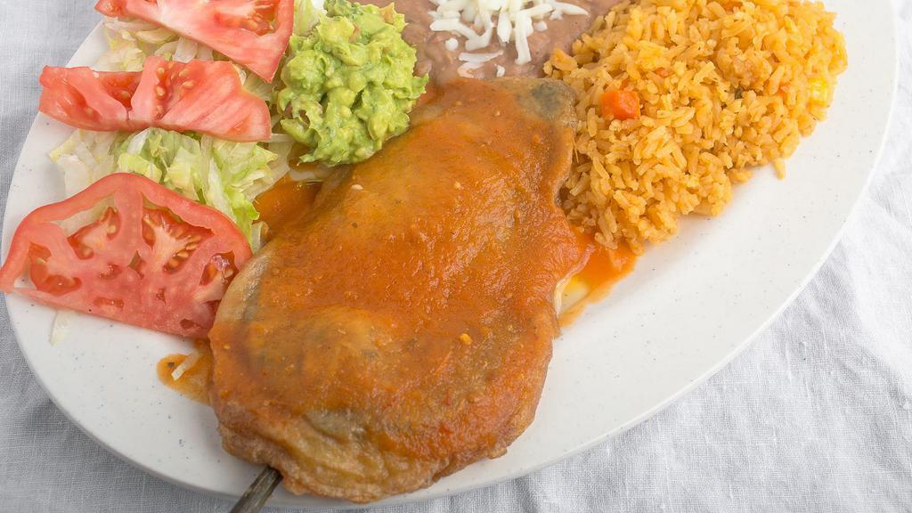 Chile Relleno · Choice of red or green sauce. Filled with cheese or ground beef. Choice of corn or flour tortilla. Served w/ Rice, Beans, Lettuce, Sour Cream, Tomatoes, Guacamole).