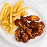 Chicken Wings (8 Pc) · Choice of buffalo, lemon pepper, BBQ, or plain.