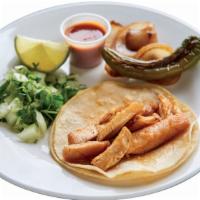 Taco · Authentic Mexican taco served with your choice   meat and choice  tortilla.  (Tortilla, Choi...