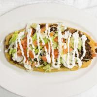 Huarache · Authentic Mexican Huarache consisting of masa served with your choice of meat. (Beans, Meat,...