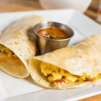 Breakfast Taco · Egg plus 2 items from the mix-in list Served with ranchero salsa. Additional items .75 each