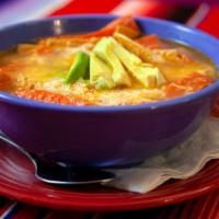 Chicken Tortilla Soup · Shredded Chicken With Tortilla Chips, Avocado Slices, And Topped With Monterrey Jack Cheese.