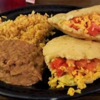 Gorditas Plate · Two Gorditas Filled With Chicken Or Beef, Lettuce, Cheese, And Tomatoes Served With Rice And...