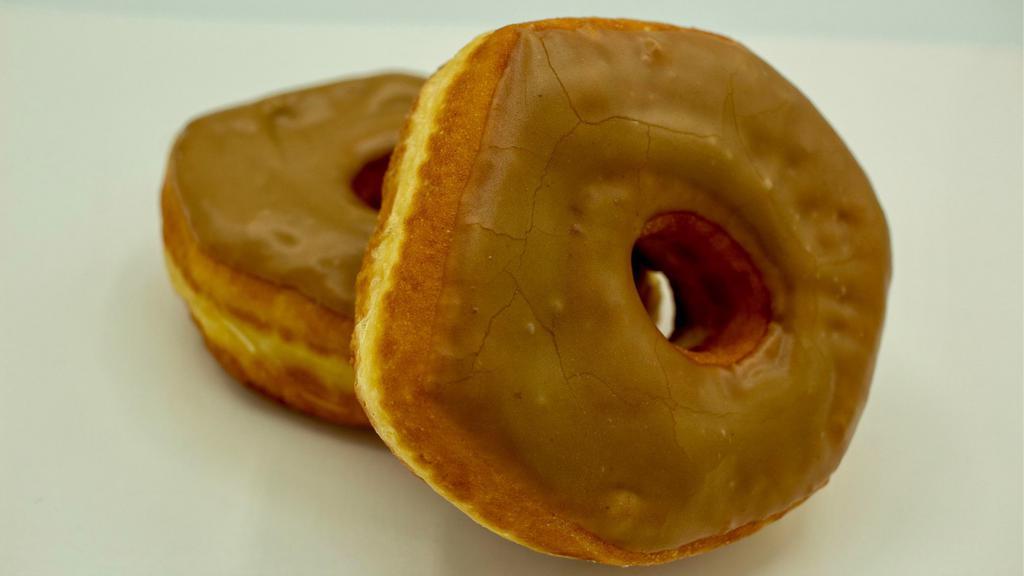 Maple Iced · Yeast raised donut dipped in a caramel colored, maple flavored icing