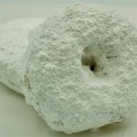 Sugar White Donut · Yeast raised donut covered in powdered sugar.