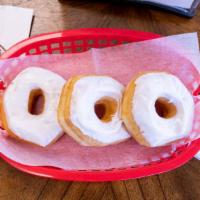Vanilla (White) Iced · Our yeast-raised donut dipped in vanilla white icing.