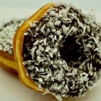 Chocolate Iced Coconut · Our yeast-raised donut dipped in chocolate icing covered in coconut shavings.
