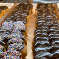 Chocolate Iced Donut Holes · A bag of dozen (12) yeast raise donut holes covered with chocolate iced .