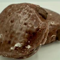 Devil Food Filled · Our yeast-raised chocolate shell donut filled with chocolate filling. $1.49