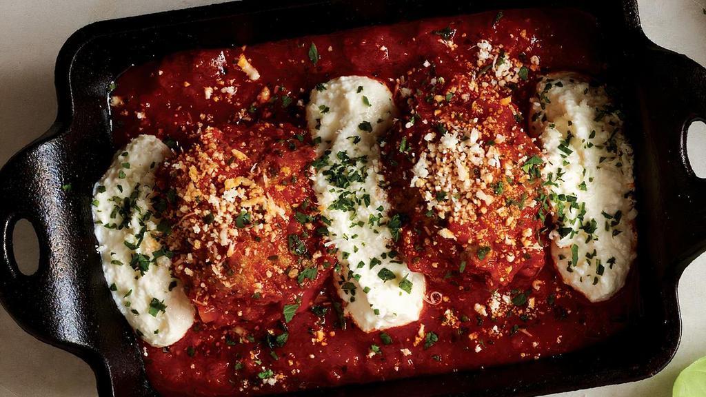 Meatballs & Ricotta · Simmered in our pomodoro sauce with ricotta and romano cheese