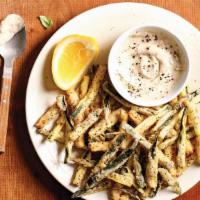 Zucchini Fritte · Hand-breaded, lightly fried and served with roasted garlic aioli