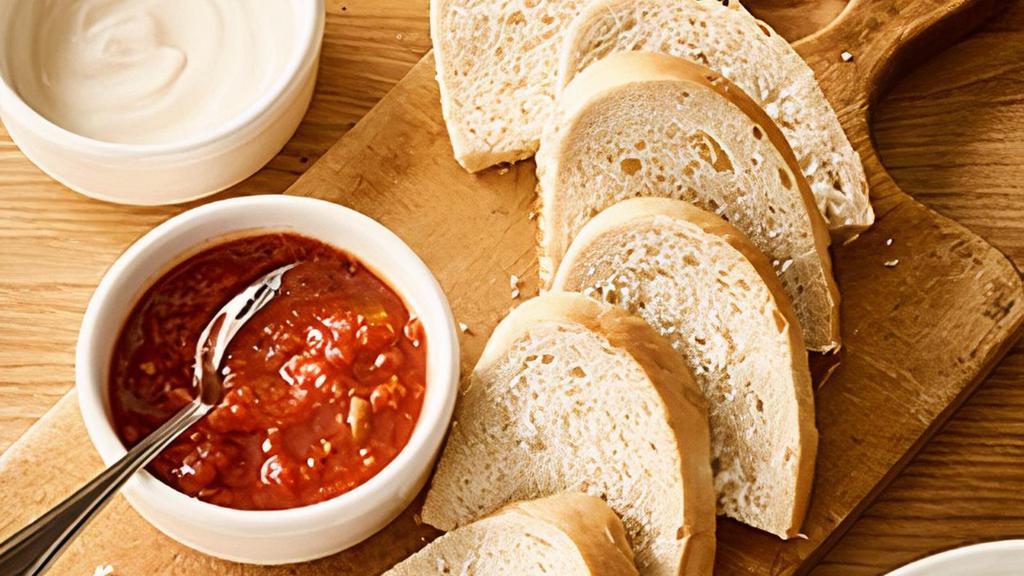 Bread And Dipping Sauce Trio · Enjoy our warm bread with a trio of made-from-scratch sauces including Alfredo, Marinara and Sugo Rosa tomato cream