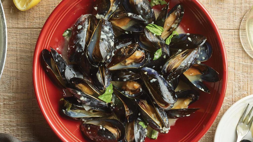 Cozze In Bianco · Prince Edward Island mussels steamed in white wine, basil and our lemon butter sauce