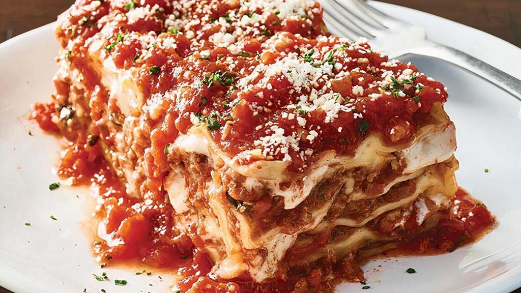 Lasagne · Pasta layered with our pomodoro sauce, meat sauce, ricotta, romano and mozzarella cheese