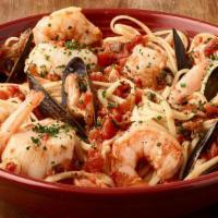 Linguine Pescatore · Shrimp, sea scallops, mussels and spicy marinara sauce