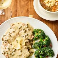 Veal Piccata · Thin, tender cutlets of veal lightly dusted with flour, sauteed and topped with lemon butter...