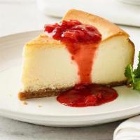 Strawberry Cheesecake · Creamy New York-style cheesecake topped with our strawberry puree