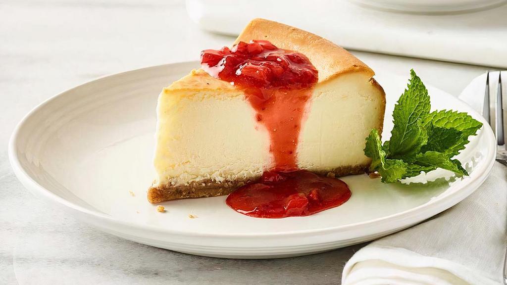 Strawberry Cheesecake · Creamy New York-style cheesecake topped with our strawberry puree