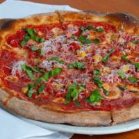Margherita Pie · Favorite. Ragu with sliced tomatoes and fresh mozzarella finished with basil and Parmesan.