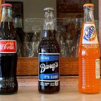 Glass Bottled Coca-Cola Beverage · 1 Bottle of either Coca-Cola, Barq's Root beer, or Fanta Orange.