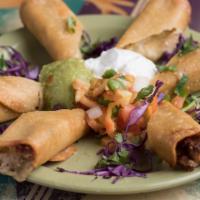 Taquitos · Fried corn tortillas, stuffed with chicken served with guacamole, sour cream and pico de gal...