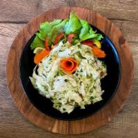Cabbage Salad · Vegetarian. Shredded Cabbage, Carrots, Lemon Juice, Olive Oil, Oregano.