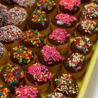 Sprinkle Donut Holes · Dozen of chocolate & sprinkle donut holes