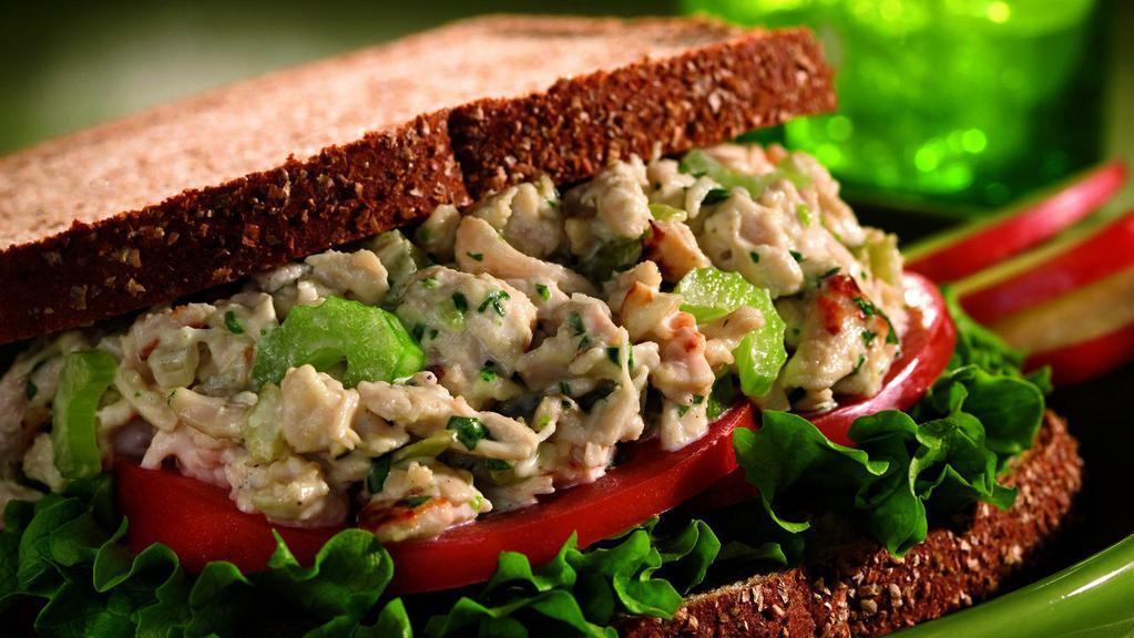 Classic Chicken Salad · (670 cal). Toasted sunflower grain bread with fresh made chicken salad, sliced tomatoes and mayo.