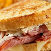 Market Street Reuben · (510 cal). Rye bread piled with corned beef, sauerkraut and Swiss cheese, served with Dijon ...