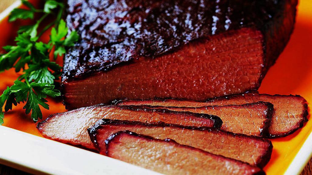 Brisket Family Meal · 1 1/2 lbs. With two sides and bread.