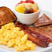 Meat Lover'S Breakfast · Two eggs, bacon, ham & sausage, choice of side & toast