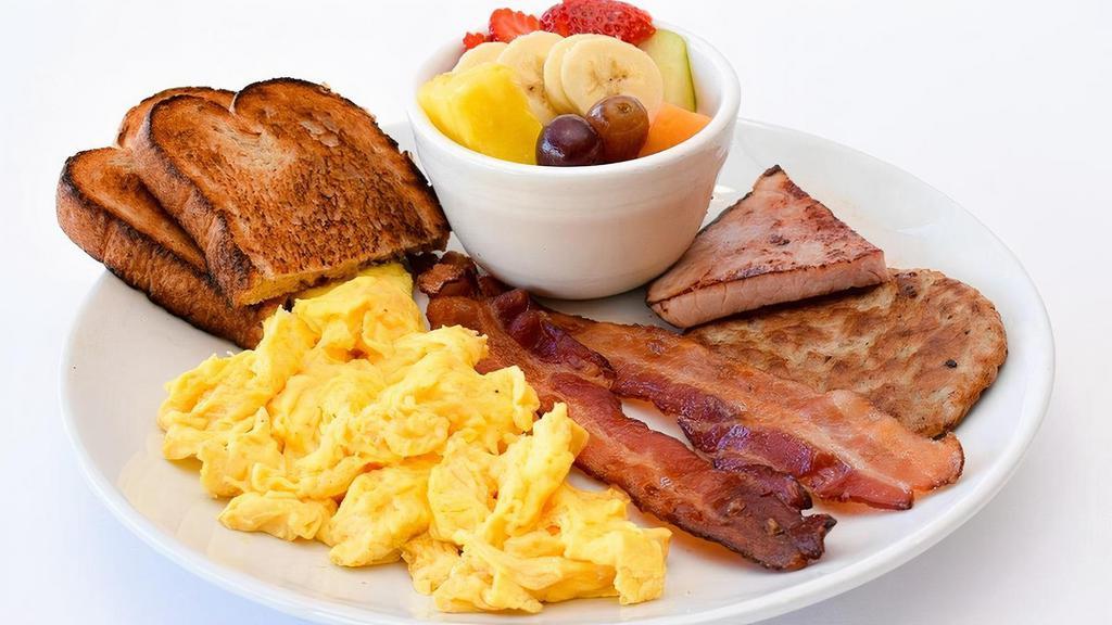 Meat Lover'S Breakfast · Two eggs, bacon, ham & sausage, choice of side & toast