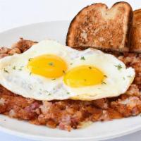 Homemade Corned Beef Hash · A secret family recipe! Served with two eggs and toast
