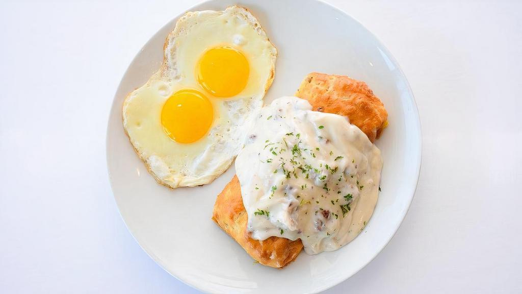 Stuffed Biscuit & Gravy · A giant fresh baked biscuit stuffed with sausage, peppers, onions & cheese. Topped with gravy and served with two eggs (no modifications available)