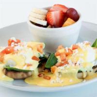 Sunny Street Benedict · Poached eggs, fresh spinach, toasted English muffin, creamy hollandaise, diced tomato & feta...