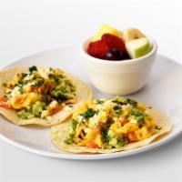 Migas Breakfast Tacos · Egg, tortilla chips, queso fresco, cilantro, pico de gallo & avocado. Choice of side