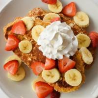 French Toast Crunch · Sweet granola-crunch coating, strawberries, bananas & whip