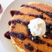 Wildberry Crumble Pancakes · Blueberries, streusel, homemade berry jam & whip
