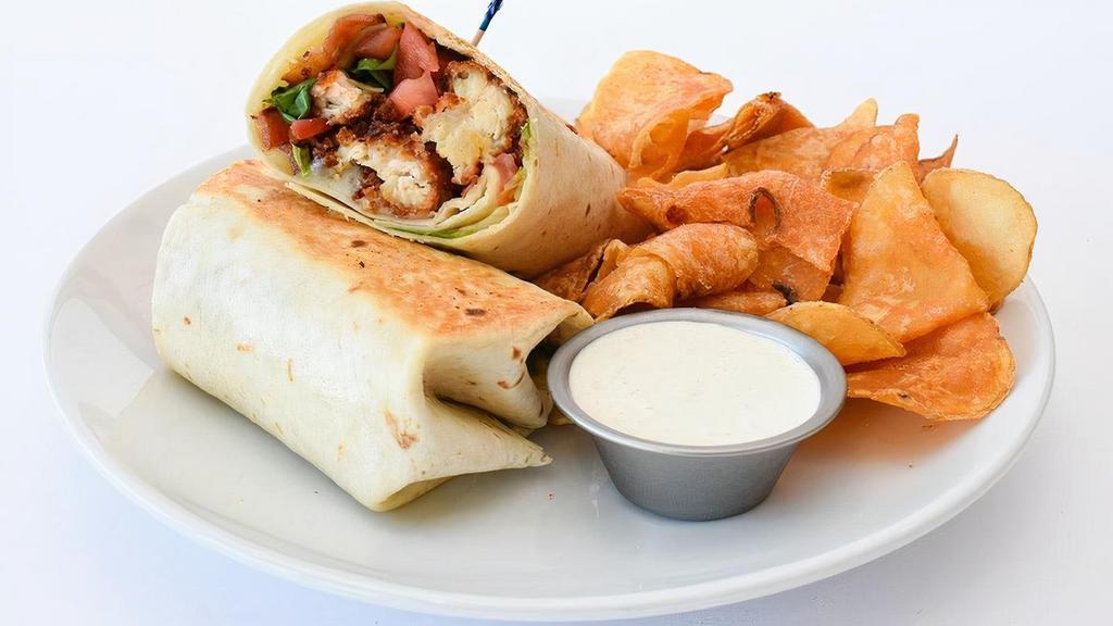 Monterey Ranch Chicken Wrap · Crispy or grilled chicken breast, Monterey jack, bacon, lettuce, tomato & a side of house ranch