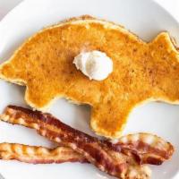 Dinosaur Pancake · Buttermilk pancake in a fun dinosaur shape served with your choice of meat.