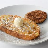 Kids French Toast · Sourdough dipped in a cinnamon batter and topped with powdered sugar.