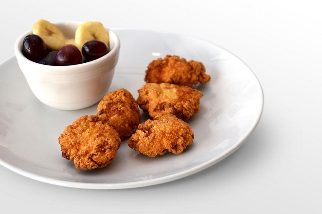 Kids Chicken Fingers · Crispy Chicken Nuggets served with your choice of side.