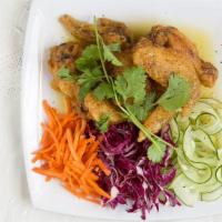 Fried Chicken Wings · Crispy chicken wings tossed with choices of (classic butter sauce/ sweet and sour sauce/ ori...