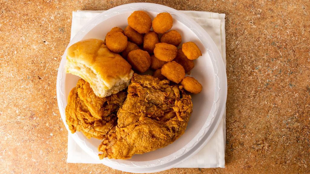 Two Piece Chicken · Served with gravy and a biscuit or roll. Served with a regular side and a large drink.