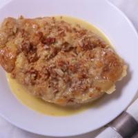 Bread Pudding · With caramel whiskey sauce or vanilla sauce. (Add raisins, pecans and/or strawberries per re...