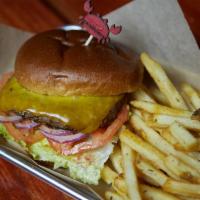 Wagyu Cheeseburger · With cajun fries. Lettuce, tomato, onion, mayonnaise, and Cheddar.